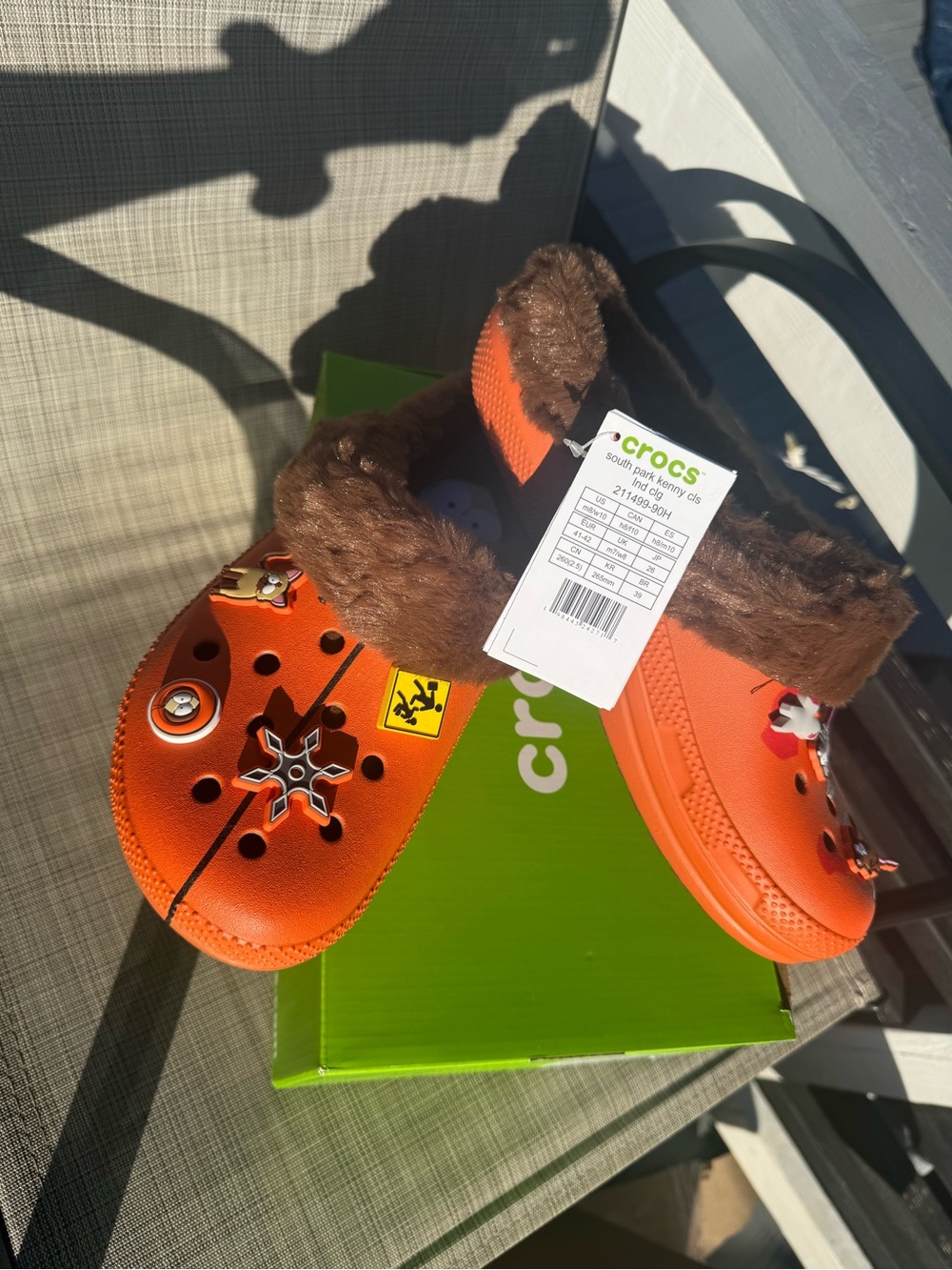 CROCS Mens and Women’s Orange Faux-Fur Lined Clogs with Charms